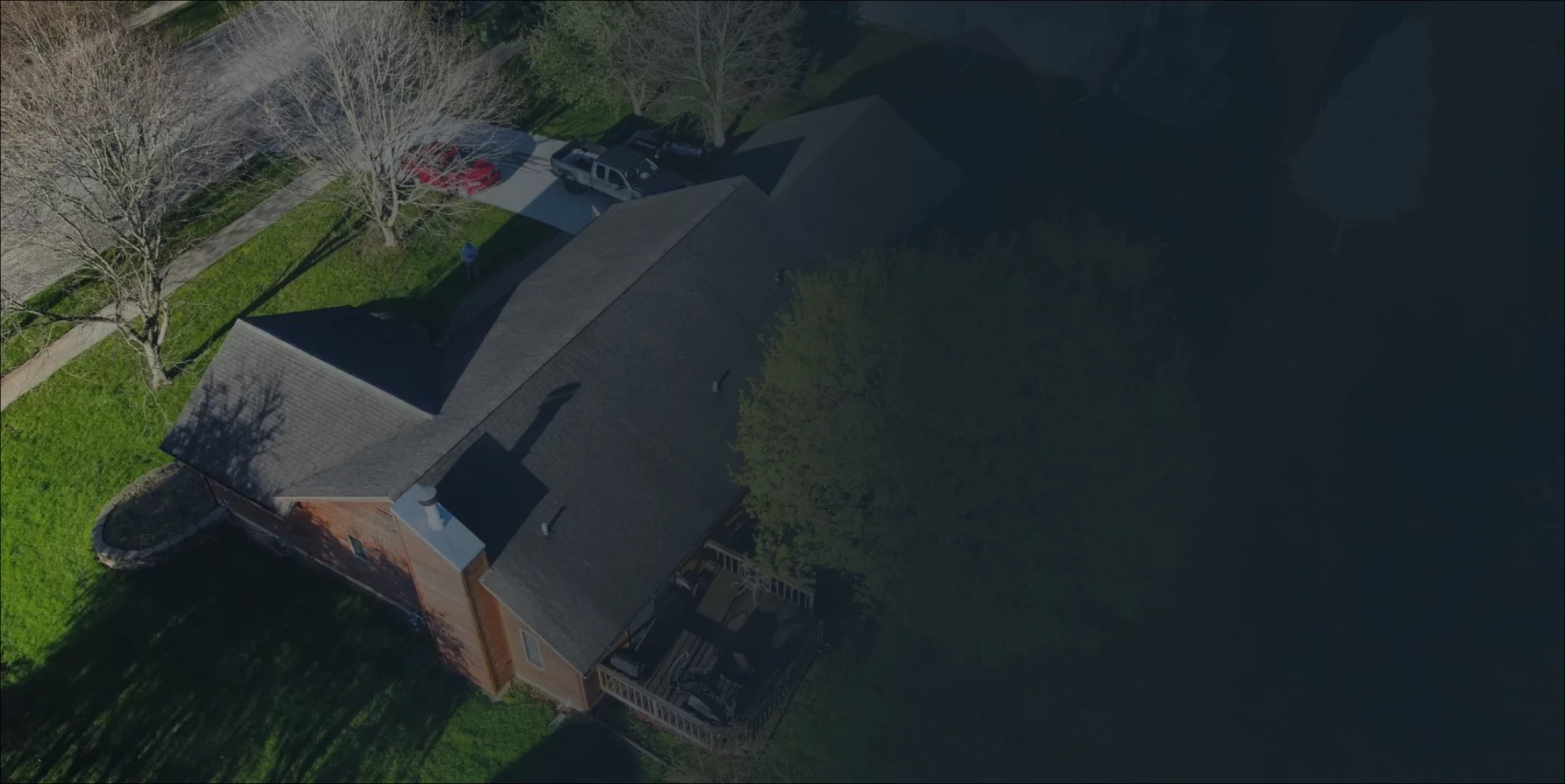 aerial view of a home with renovated roof